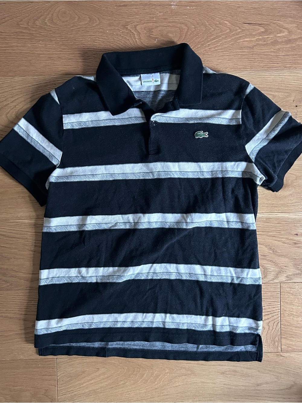 Lacoste Black Polo with White Horizontal Stripes